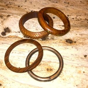 Assorted bracelets - 4 - mix of wood and metal.